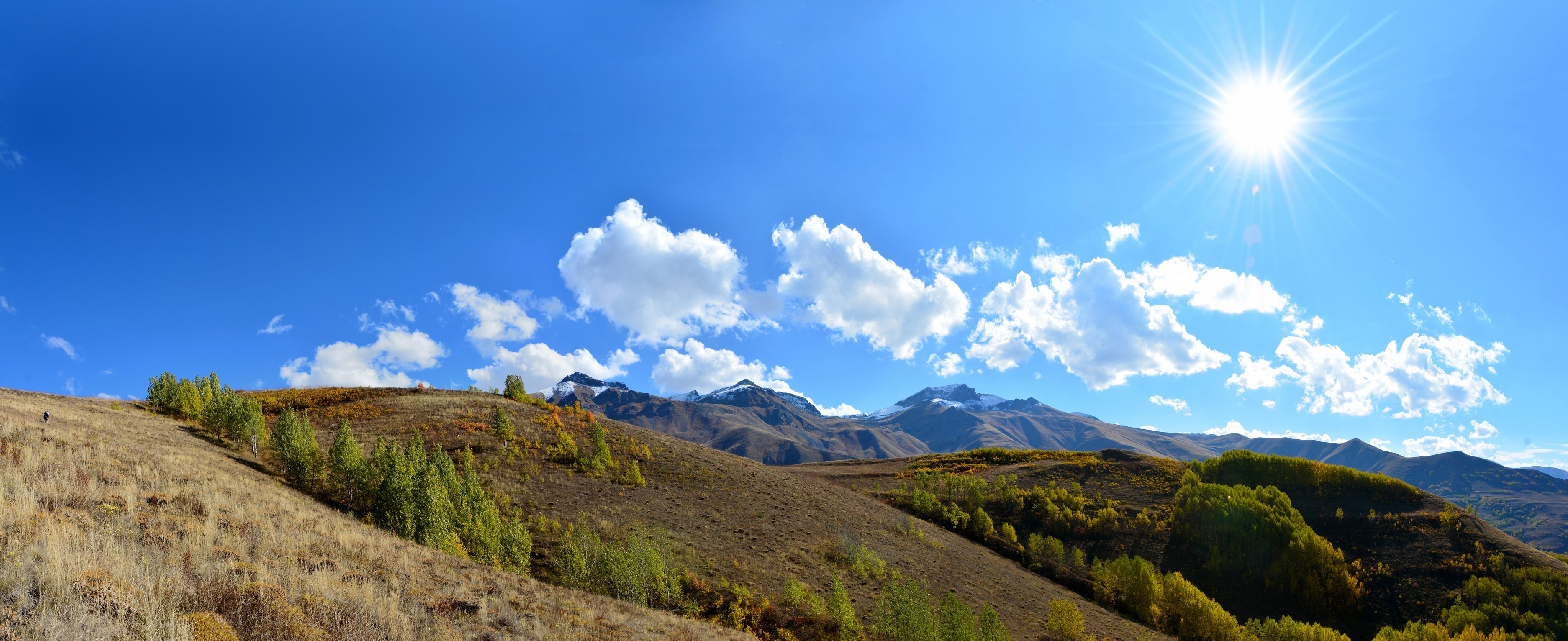 Green Hills Landscape With Clear Blue Sky